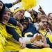 Michigan senior quarterback Denard Robinson celebrates in the student section after a football game at Michigan Stadium on Saturday afternoon. Michigan defeated Iowa 42 to 17.Joseph Tobianski | AnnArbor.com